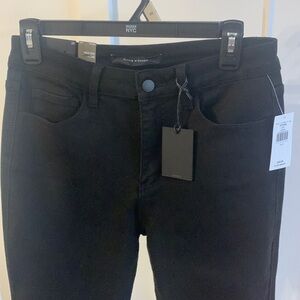 Flying Monkey black high rise flare jeans from Buckle. Fringed hem. 28x34